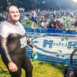 Dressed in a wetsuit and ready to race!
